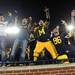 Michigan fans celebrate after Michigan beat Notre Dame 35-31 during the first-ever night game at Michigan Stadium on Saturday. Melanie Maxwell I AnnArbor.com